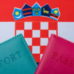 Croatia work visa reforms 2026 showing passports and Croatian flag